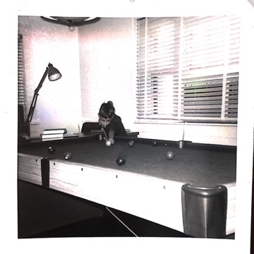 Me playing pool when I was about 10 or 11